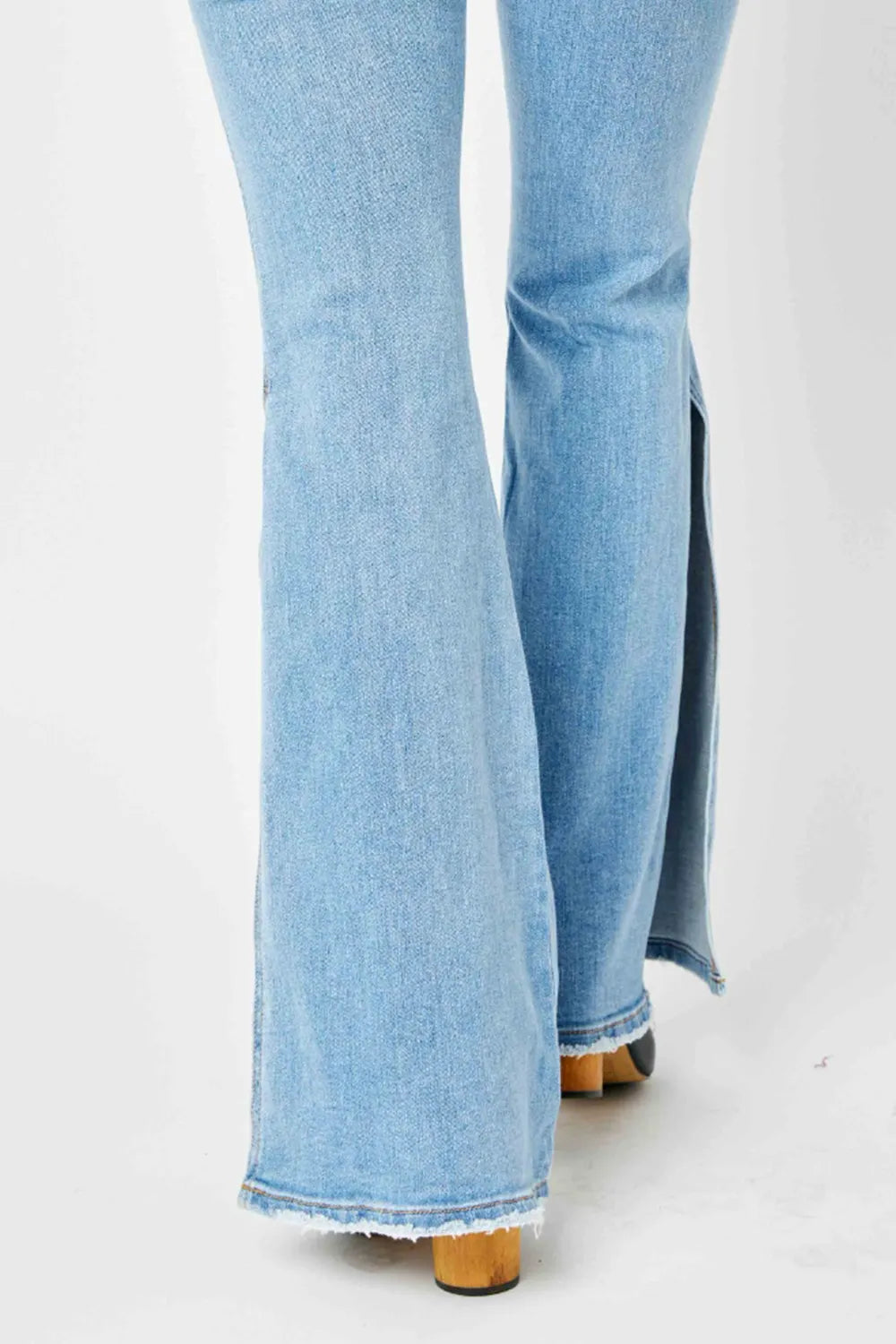 Judy Blue Full Size Mid Rise Raw Hem Slit Flare Jeans - WYNFLARE