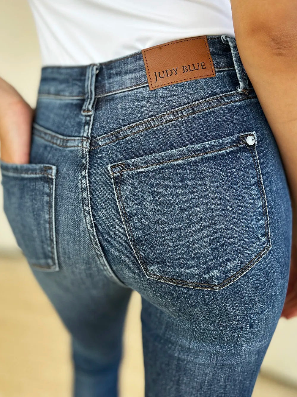Judy Blue Full Size Mid Waist Distressed Slim Jeans - WYNFLARE