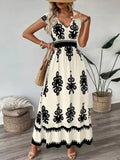 Ruffled Printed V-Neck Maxi Dress - WYNFLARE